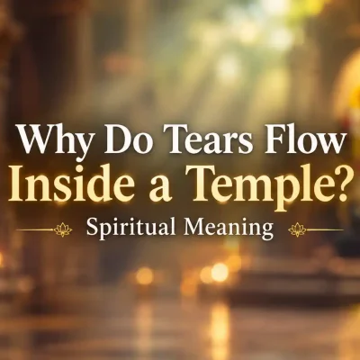 Devotee standing before a temple deity with tears of spiritual emotion