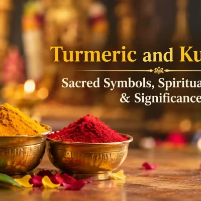 Golden turmeric powder and red kumkum placed together on a traditional puja thali